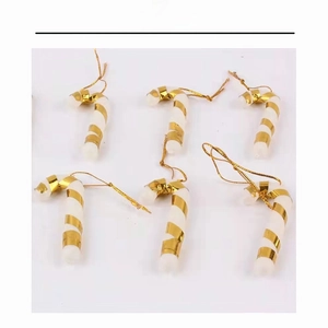 Set of 6 white foam candy cane ornaments with gold metallic ribbons for Christmas tree