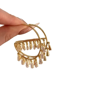 Gold hoop earrings with tiered pink zircon rectangle fringe drops on white background