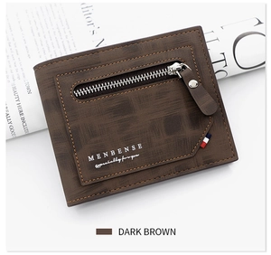 Detail view of dark brown men's wallet showing premium leather texture and outer zipper
