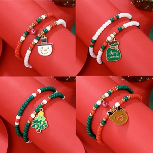 Christmas beaded bracelets set with snowman and Santa charms in a four-grid display