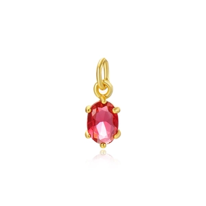 Close-up of a 5x7mm red oval zircon pendant with four-claw gold plating for DIY jewelry