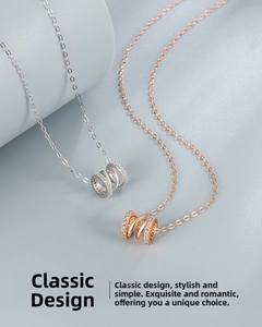 Detail of S925 silver and rose gold necklaces featuring interlocking zircon triple rings