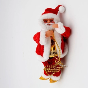 Close-up of animated Santa Claus in red velvet suit climbing a golden bead chain
