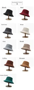 Detailed grid view showcasing various colors of twill bucket hats on wooden stands