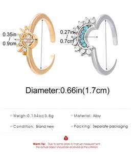 Detailed view of sun and moon open rings with size dimensions and rhinestones
