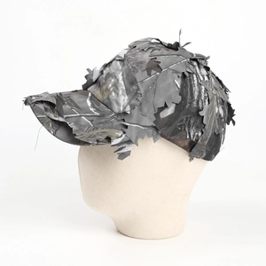 Detail of 3D leaf camo baseball cap showing tactical jungle camouflage fabric texture