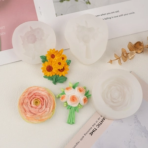 Detail view of sunflower and rose silicone molds for DIY soap and plaster making