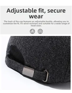 Detail of adjustable metal buckle and textured grey fabric on winter baseball cap for men