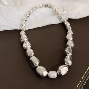 Irregular silver metal beaded necklace with white baroque freshwater pearl choker