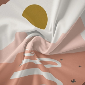 Detail of bohemian tapestry fabric showing abstract sun mountains and twill texture