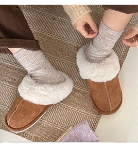 Brown home slippers with white plush lining and soft faux fur collar detail