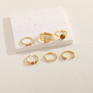 6-piece gold-plated ring set featuring tiger eye, zircons, and geometric bohemian designs