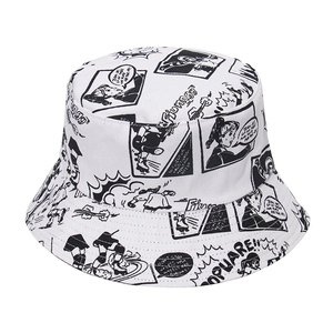 Close-up of the black manga character print on white canvas bucket hat texture