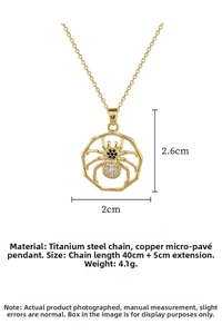 Macro detail of gold spider web pendant with inlaid stones and titanium steel chain