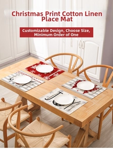 Detailed texture of Christmas place mats with reindeer and snowflake festive prints