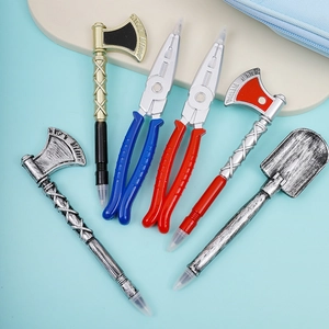 Detailed view of creative novelty ballpoint pens in hammer, plier and shovel shapes