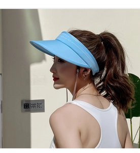 Detail view of light blue wide brim sun visor with Sunshine text and side profile design