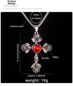 Detail of silver gothic cross necklace with red heart acrylic and rose design