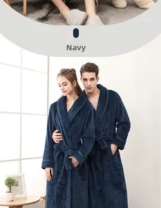 Detail of navy blue waffle textured flannel bathrobe with waist tie and side pockets
