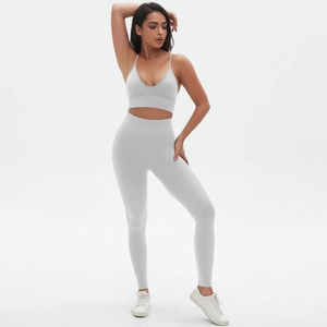 Close-up of seamless gray yoga set featuring V-neck sports bra and high waist leggings