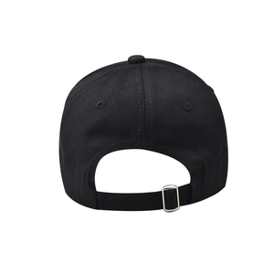 Detail of black cotton baseball cap back with adjustable strap and metal buckle