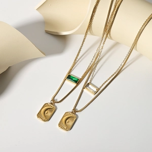 Double-layered gold stainless steel necklace with sun moon pendant and zircon stones