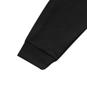 Detailed macro view of black ribbed elastic cuffs with textured waffle knit fabric