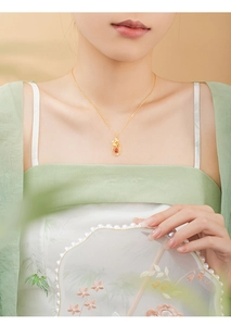Detailed close-up of a 925 silver necklace featuring a red agate teardrop pendant