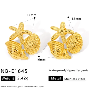 Detail view of gold ocean-themed earrings featuring starfish and shell charms with size labels