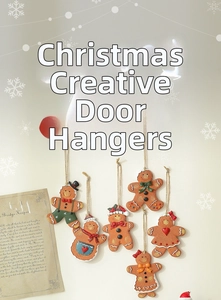 Detailed close-up of six resin gingerbread man ornaments hanging with rustic hemp ropes