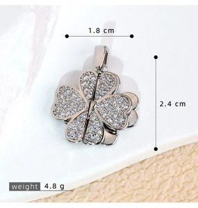 Detail of clover foldable zircon necklace pendant showing 1.8cm width and 2.4cm height
