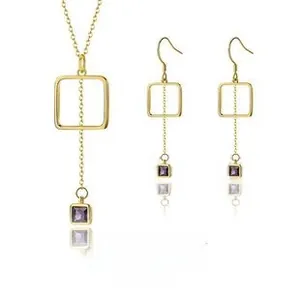 Detail of S925 silver jewelry set with square purple stones and gold-plated frames
