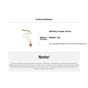 Detail view of gold clover necklace with copper and zircon material specifications