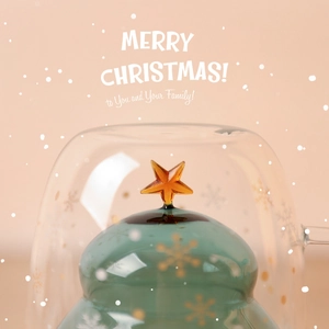 Christmas tree double walled glass mug with gold star and merry christmas greeting