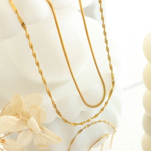 Double-layered gold titanium steel flat snake chain and water wave necklace for women