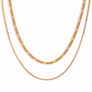 Double-layered 18K gold plated necklace with Figaro and snake chain on white background