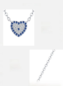Detailed macro view of S925 sterling silver heart necklace with blue and white zircons