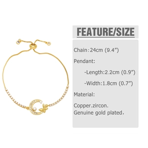 Detail of adjustable gold-plated copper bolo bracelet with zircon butterfly and pearl