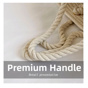 Detail presentation of cotton rope handle with knot and golden metal ring