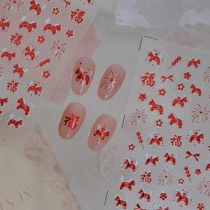 Red metallic Chinese New Year nail stickers featuring fortune characters and festive patterns