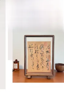 Detail view of double-sided walnut picture frame with traditional mortise and tenon joint