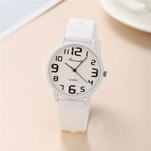 Close-up of white quartz watch featuring bold black Arabic numerals and silicone strap