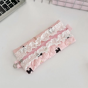 Detail of pink quilted lace pencil case with Scottish Terrier print and floral zipper