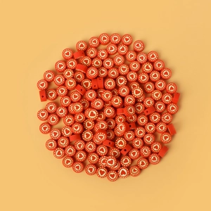 Flat round red clay beads with white heart patterns for DIY jewelry making sets