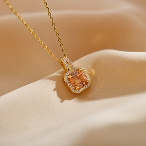 Elegant gold square champagne zircon pendant necklace with pavé diamond halo on silk