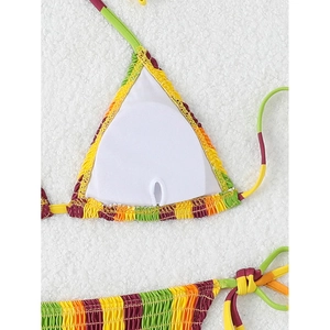Detail view of colorful striped bikini top with removable chest pads and smocking fabric
