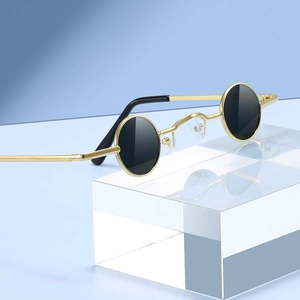 Retro small round steampunk sunglasses with gold metal frame and black lenses