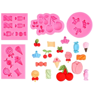 Pink silicone mold set for creating cherry, lollipop, crown, and ice cream dessert shapes