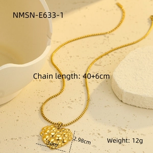 Polished gold bubble heart pendant necklace in stainless steel with elegant texture