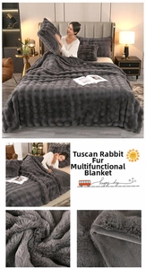 Macro view of dark grey faux rabbit fur blanket featuring thick bubble texture and soft plush